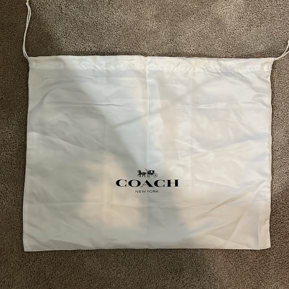 Like New navy blue Coach convertible purse. - Picture 7 of 7